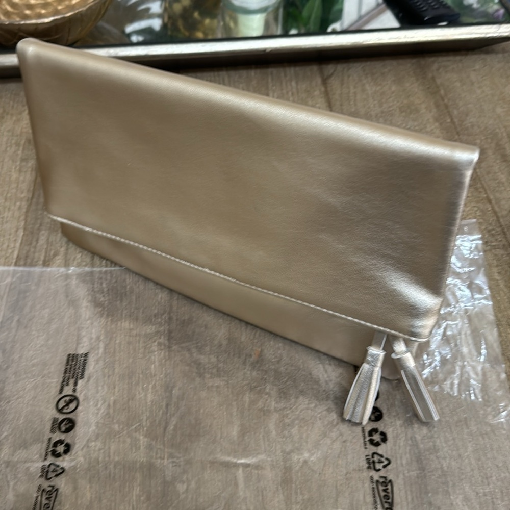 Gold foldover clutch bag by Monat NEW